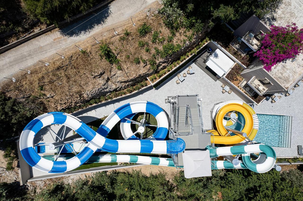 Porto Platanias Beach Resort & Spa Exterior foto Aerial view of the water park