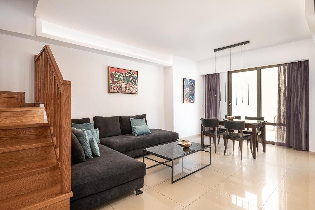 Porto Platanias Beach Resort & Spa Exterior foto A living room