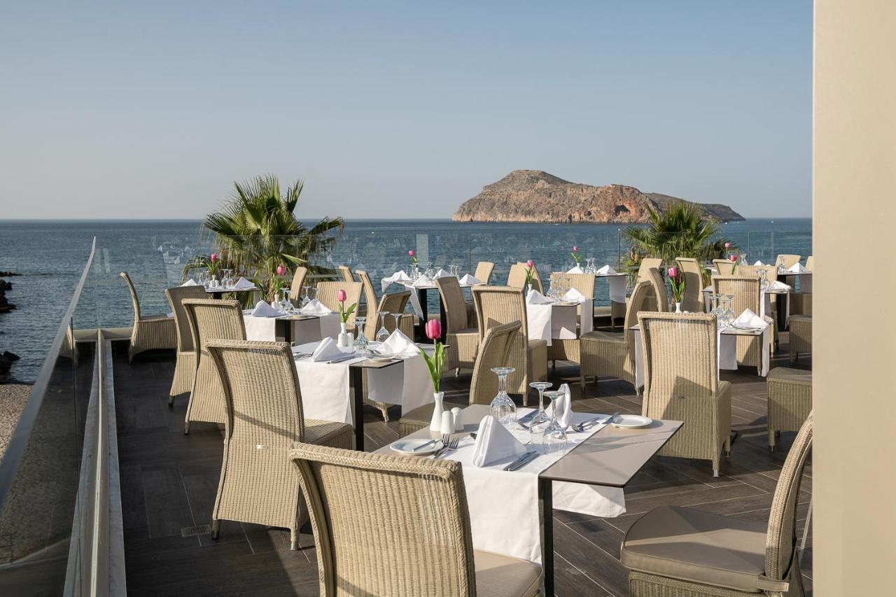 Porto Platanias Beach Resort & Spa Exterior foto The restaurant