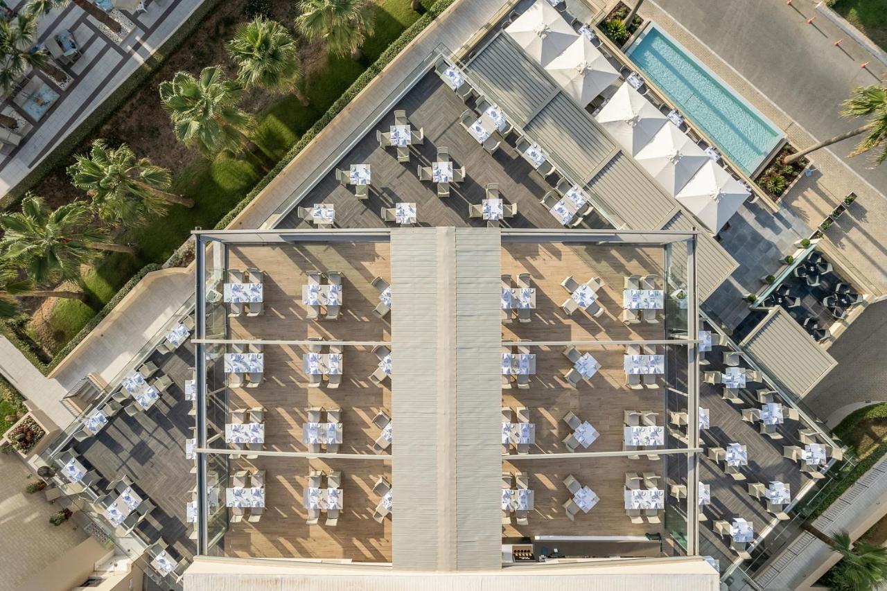 Porto Platanias Beach Resort & Spa Exterior foto The rooftop pool at the W Scottsdale