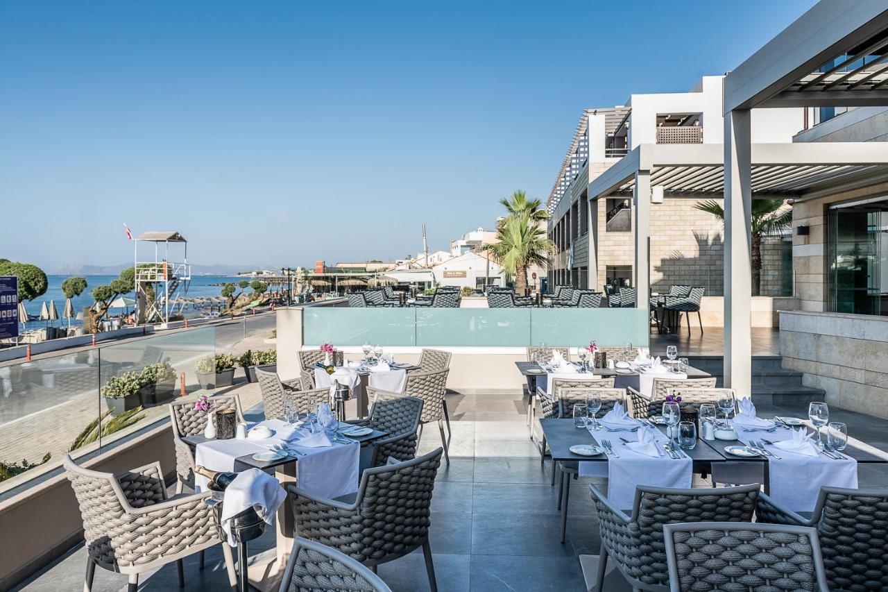 Porto Platanias Beach Resort & Spa Exterior foto The restaurant