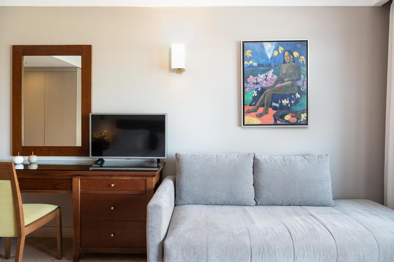 Porto Platanias Beach Resort & Spa Exterior foto A painting by the artist