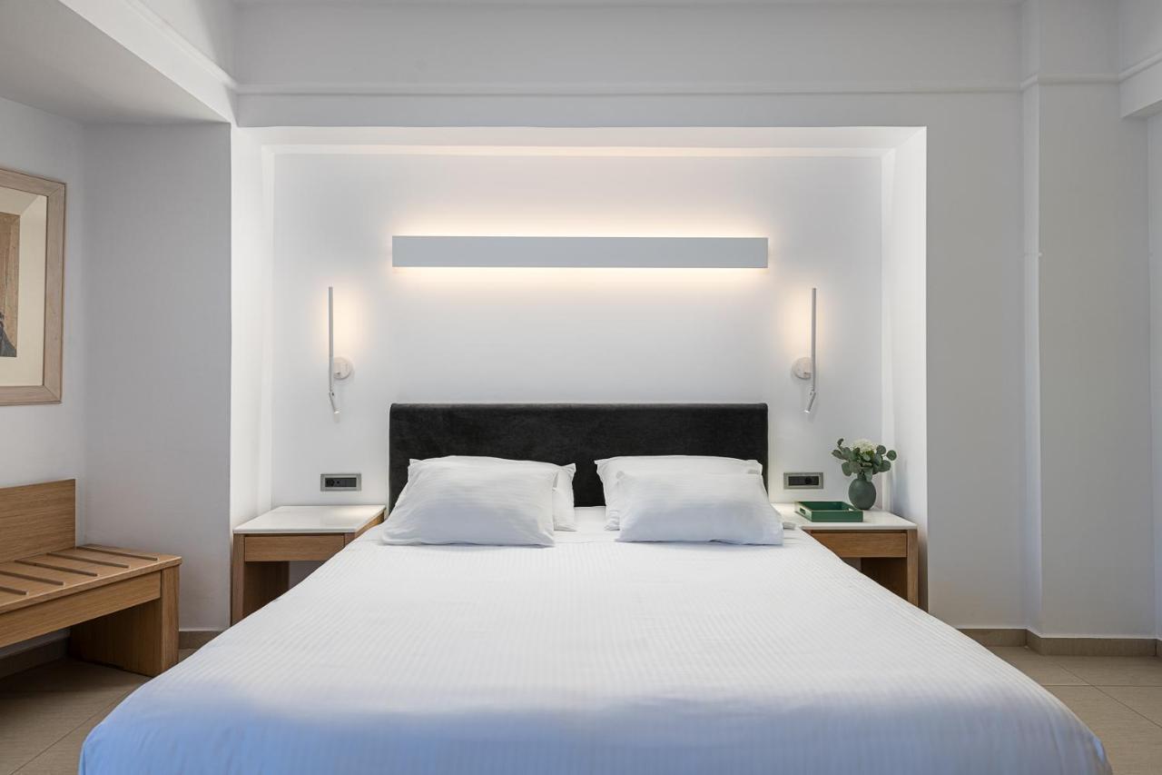 Porto Platanias Beach Resort & Spa Exterior foto A bedroom at the hotel