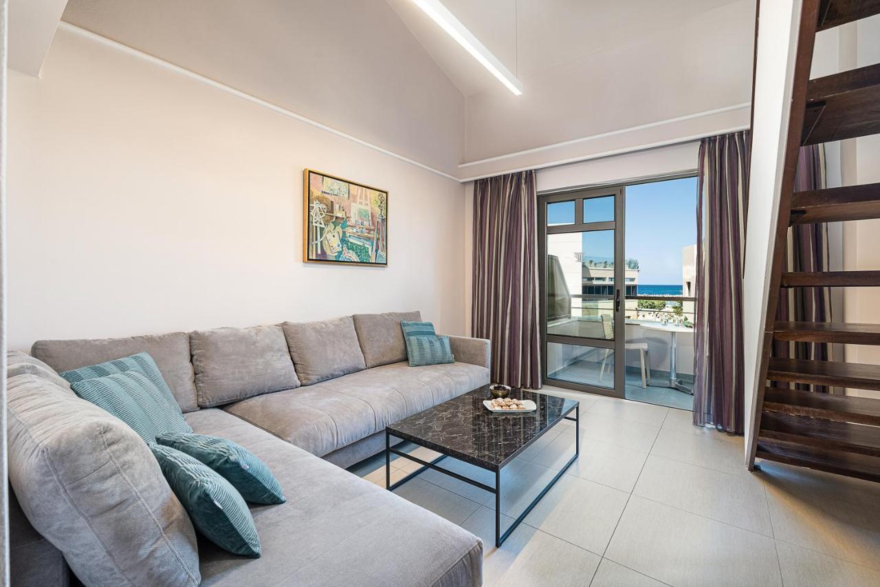 Porto Platanias Beach Resort & Spa Exterior foto A living room in a modern apartment