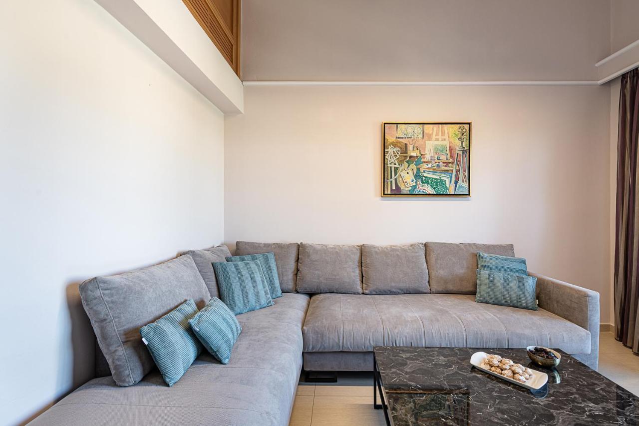 Porto Platanias Beach Resort & Spa Exterior foto A sectional sofa