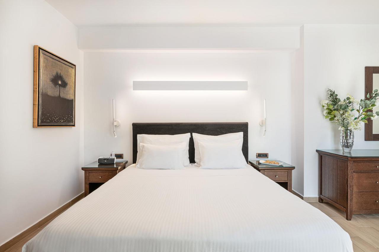 Porto Platanias Beach Resort & Spa Exterior foto A bedroom at the hotel