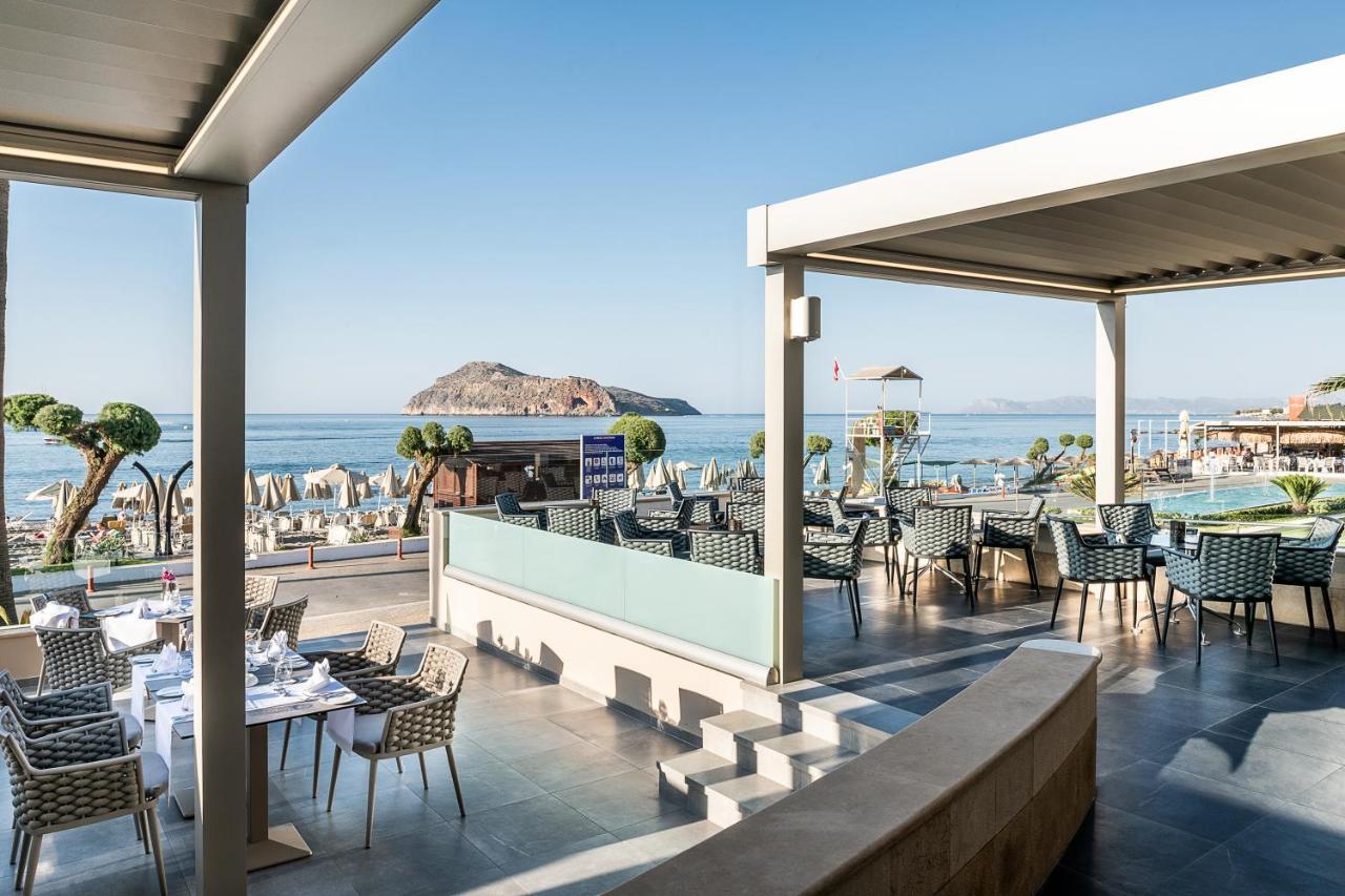 Porto Platanias Beach Resort & Spa Exterior foto The resort's main restaurant