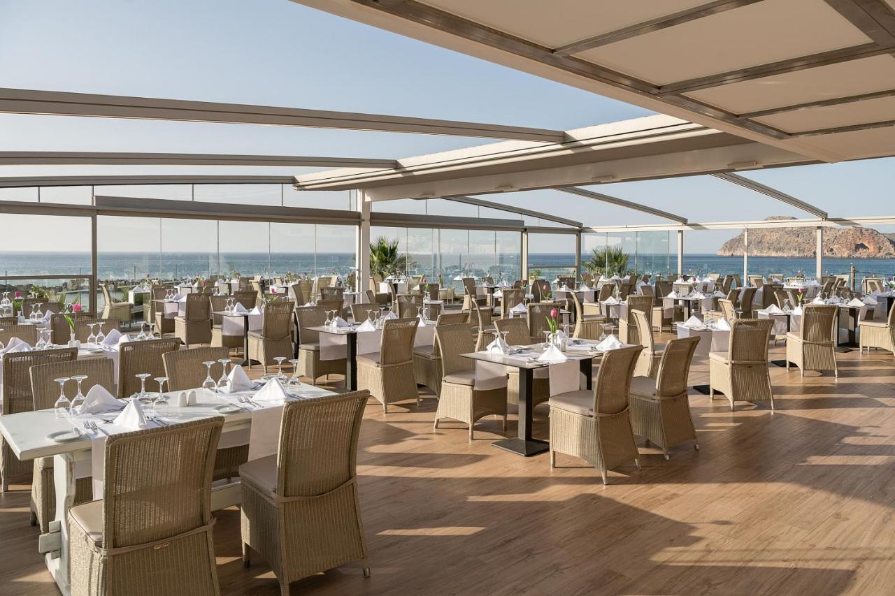 Porto Platanias Beach Resort & Spa Exterior foto The restaurant