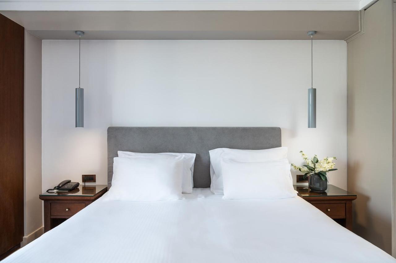 Porto Platanias Beach Resort & Spa Exterior foto A bedroom at the hotel