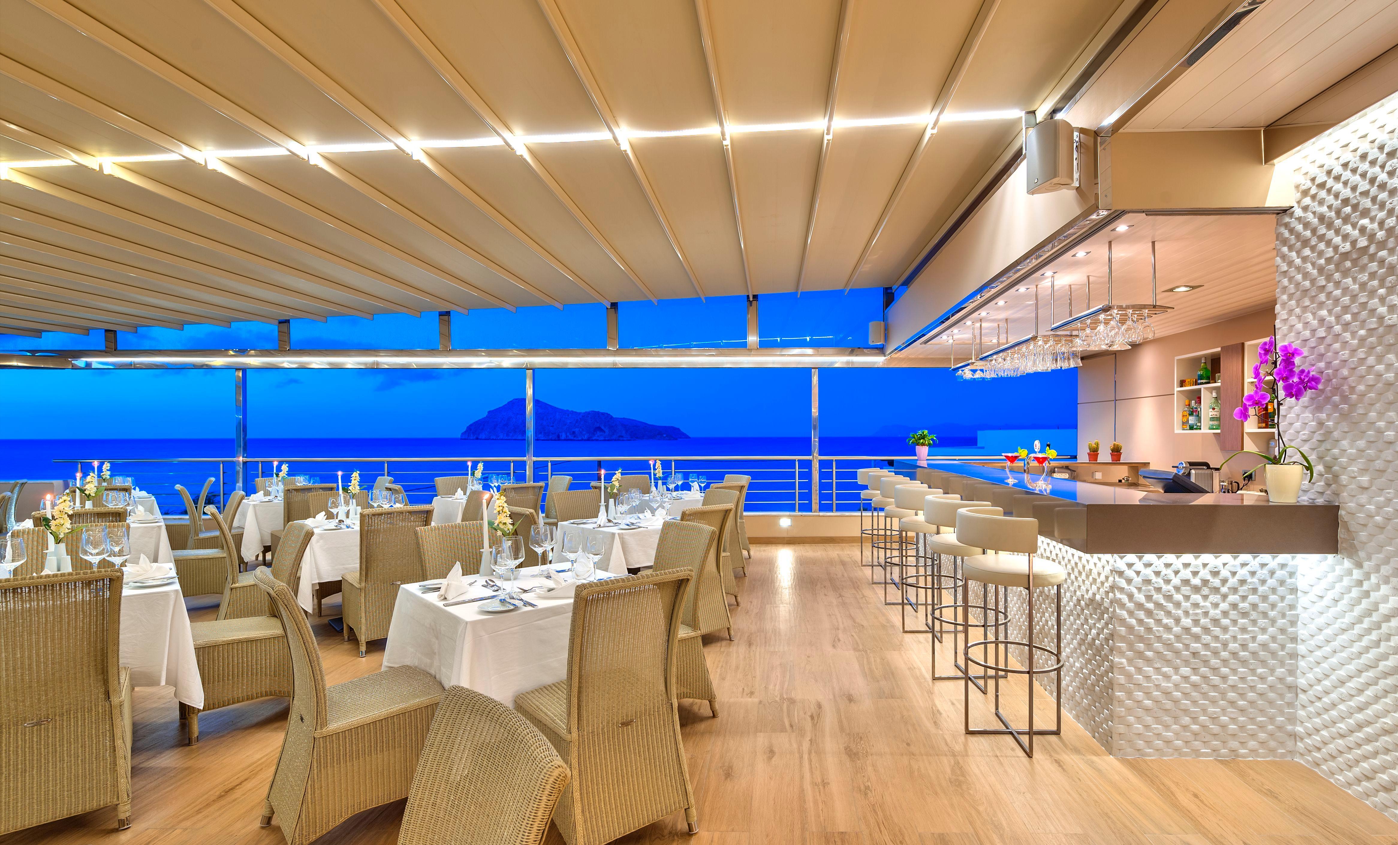 Porto Platanias Beach Resort & Spa Exterior foto The restaurant